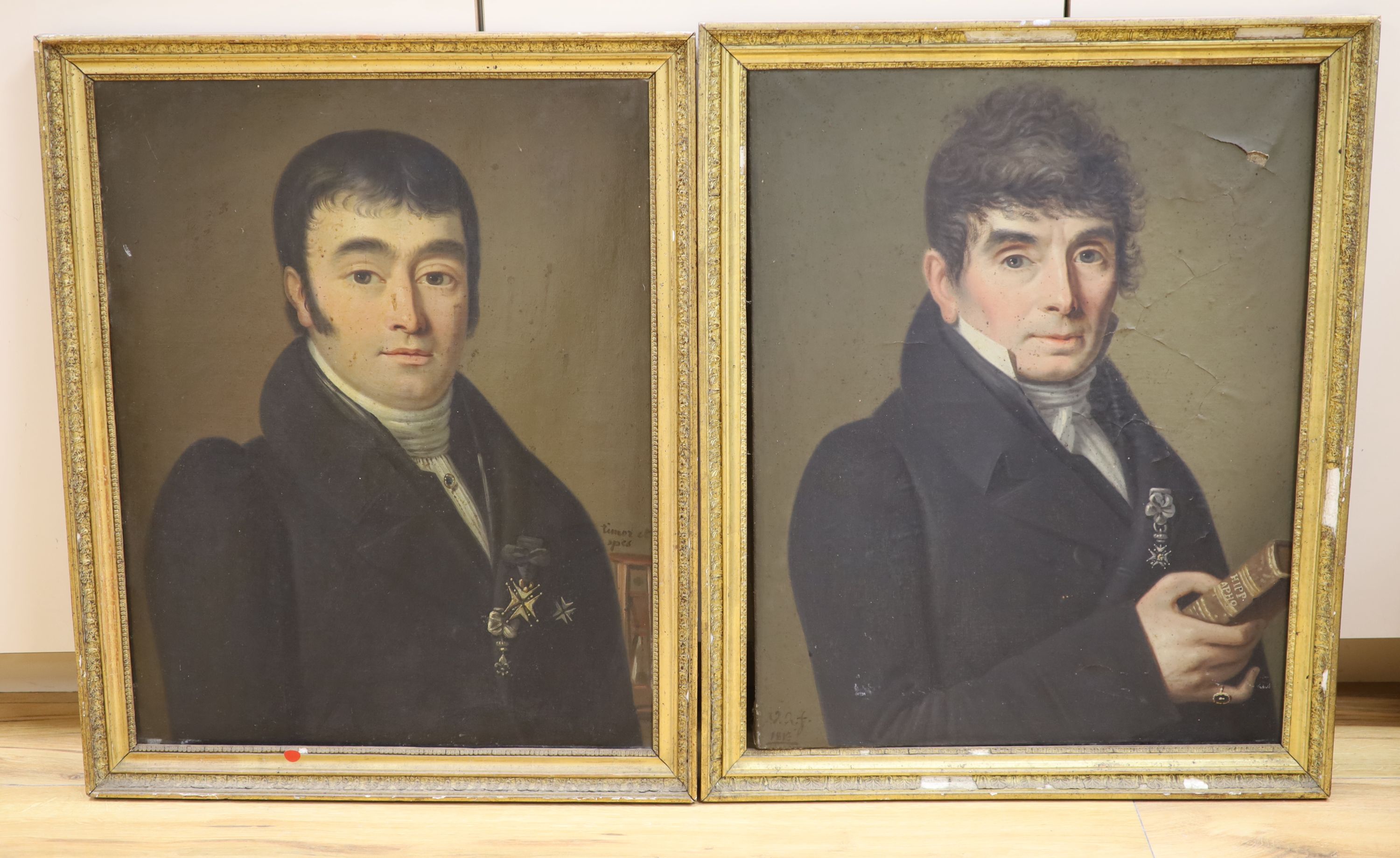 Early 19th century French School, an associated pair of portrait studies of gentleman, each wearing medals, indistinctly signed, one marked verso, 60 x 47cm.